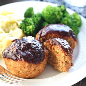 Turkey Meatloaf Muffins on dinner plate with veggies.