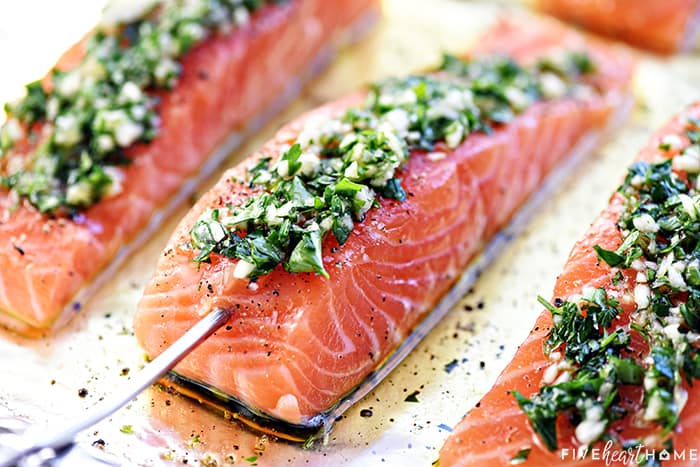 Thermometer sticking in salmon fillet, ready to go in the oven.