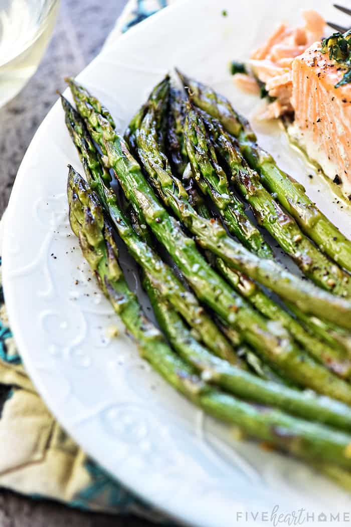 Close-up of Roasted Asparagus as a side dish on a plate.