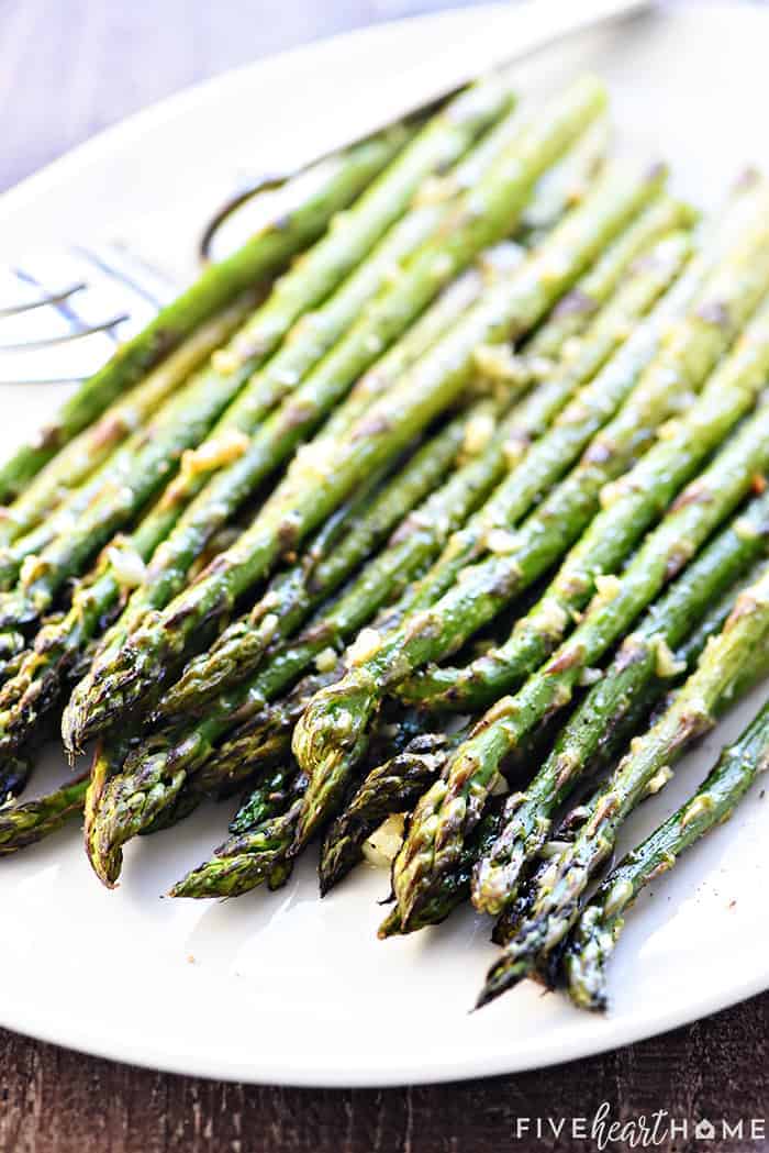 Roasted Asparagus ~ simply seasoned with olive oil, garlic, salt, and pepper for a delicious, easy, versatile, springtime side dish! | FiveHeartHome.com