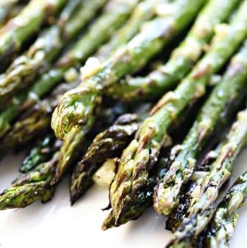 Roasted Asparagus ~ simply seasoned with olive oil, garlic, salt, and pepper for a delicious, easy, versatile, springtime side dish! | FiveHeartHome.com