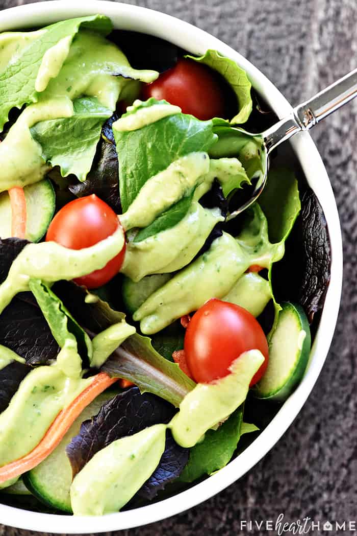 Dairy-Free Creamy Avocado Dressing ~ a silky, decadent yet healthy, non-dairy dressing -- flavored with cilantro and garlic -- that's great on salads, as a dip, and so much more! | FiveHeartHome.com #avocadodressing Aerial close-up of Avocado Salad Dressing