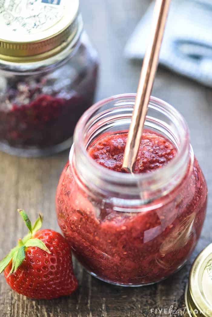 Chia Seed Jam ~ a quick, easy, delicious, and nutritious way to make jam -- without pectin or extra sugar -- using any fresh or frozen fruit you have on hand! | FiveHeartHome.com Strawberry Chia Seed Jam in a jar with a spoon