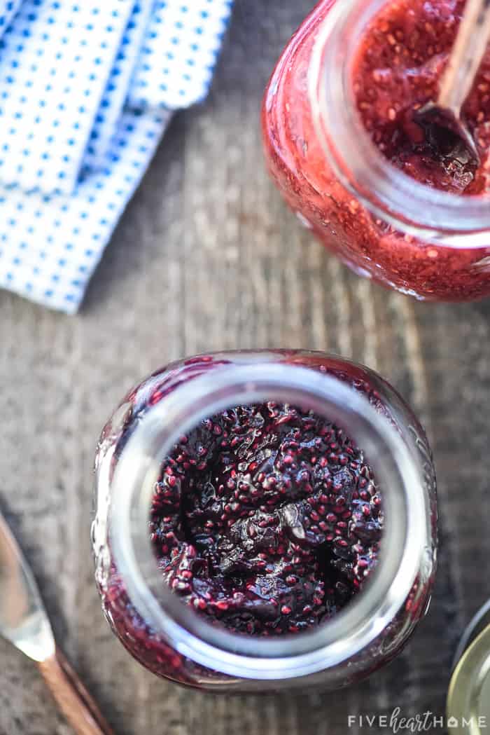 Aerial view of Chia Seed Jam in jars made with different fruit.