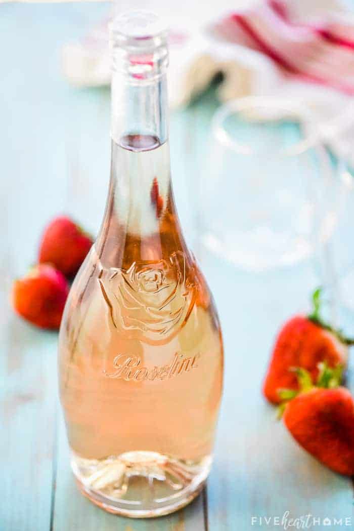 bottle of rosé wine and fresh strawberrries