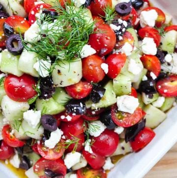 Cucumber Tomato Feta Salad with Olives + Dill ~ a perfect summer side dish recipe for using up an overabundance of garden fresh produce! | FiveHeartHome.com