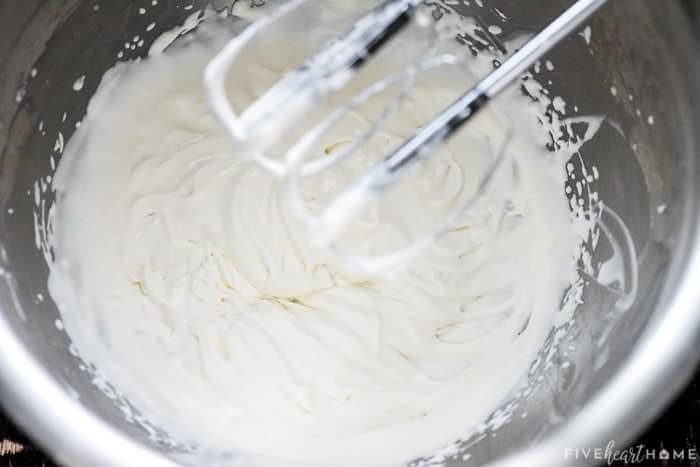 Aerial view of whipped cream in a bowl.
