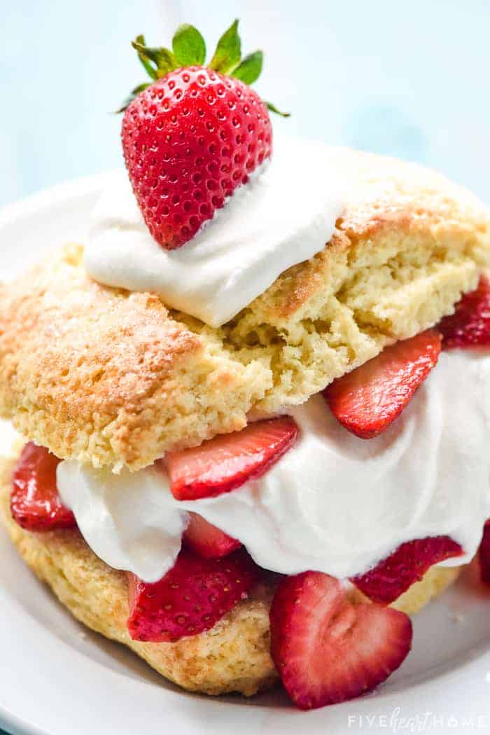 Close-up of Homemade Strawberry Shortcake with fresh berry on top.