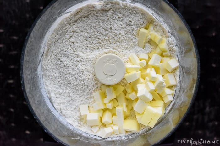 Dry ingredients and cubed butter in food processor.