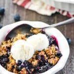 Blueberry Crisp ~ this quick, easy, amazing dessert recipe boasts sweet and syrupy blueberries with a crunchy golden oat topping...and it's even better served warm with a scoop of vanilla ice cream on top! | FiveHeartHome.com #blueberrycrisp