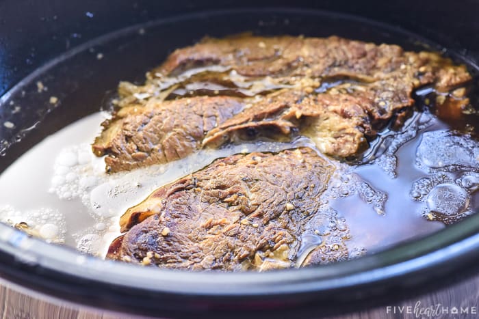 Chuck roast in broth in crock pot.