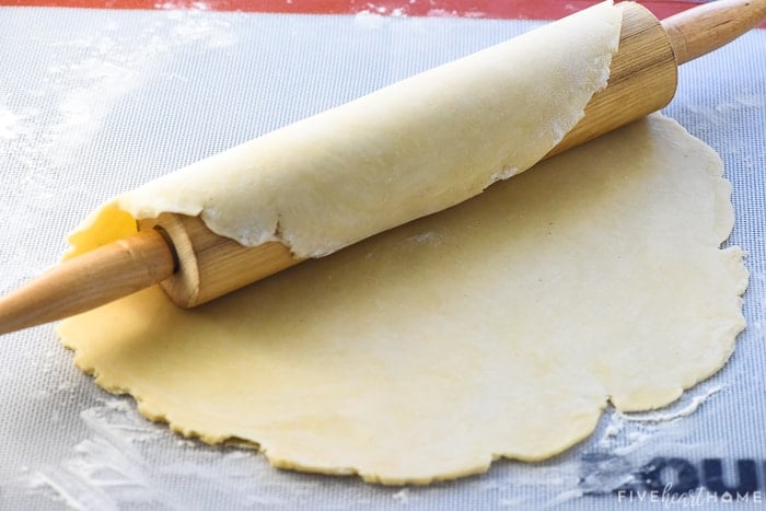 How to transfer pie crust recipe to the pan using the rolling pin.