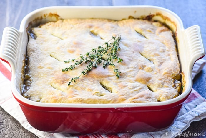 Baked Beef Pot Pie garnished with thyme.
