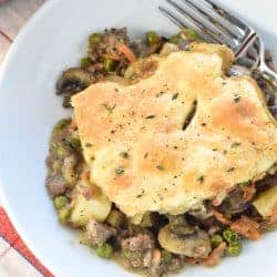Beef Pot Pie ~ a hearty, delicious comfort food recipe featuring savory ground beef and veggies in a flavorful gravy topped by a flaky, buttery pie crust. And if you prefer, it's just as easy to make it with tender cubed beef! | FiveHeartHome.com #potpie #beefpotpie #potpierecipe