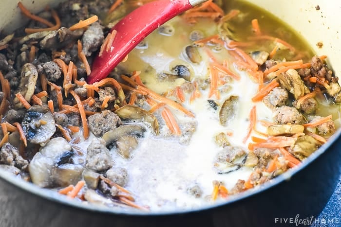 Stirring liquids in to make gravy.