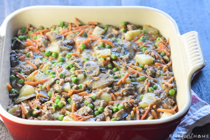 Filling spread into baking dish.