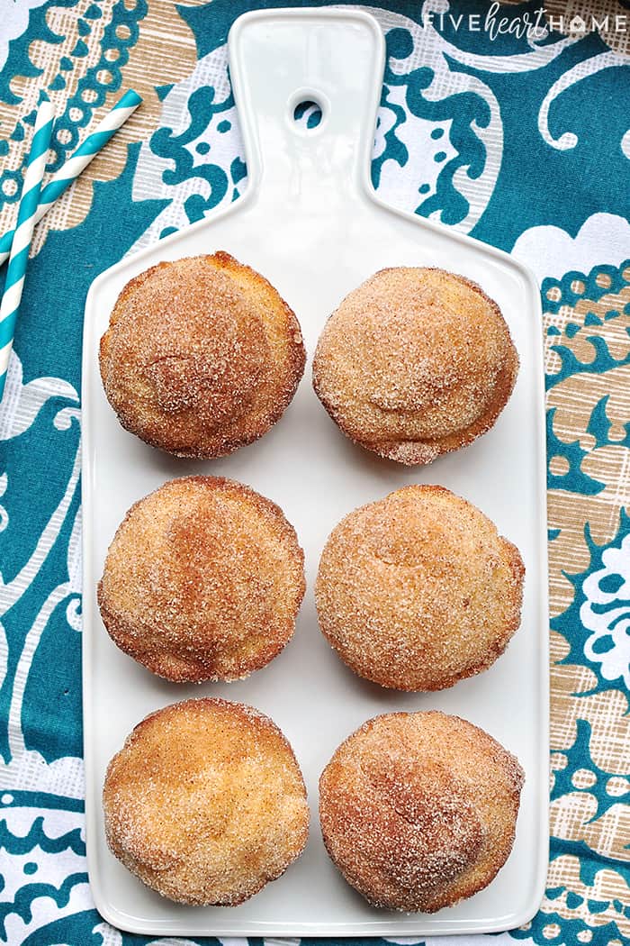 French Breakfast Puffs ~ tender vanilla muffins drenched in melted butter and dipped in cinnamon sugar for a sweet and crunchy coating that makes breakfast time a treat! | FiveHeartHome.com French Breakfast Puffs on a serving platter aerial view