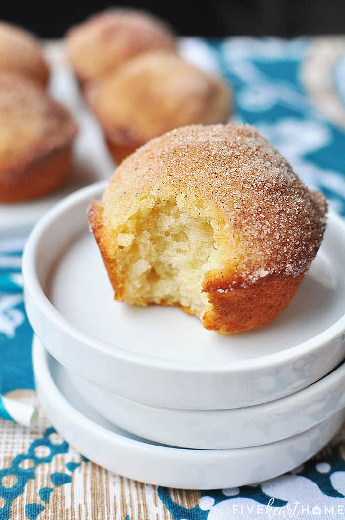 French Breakfast Puffs ~ tender vanilla muffins drenched in melted butter and dipped in cinnamon sugar for a sweet and crunchy coating that makes breakfast time a treat! | FiveHeartHome.com