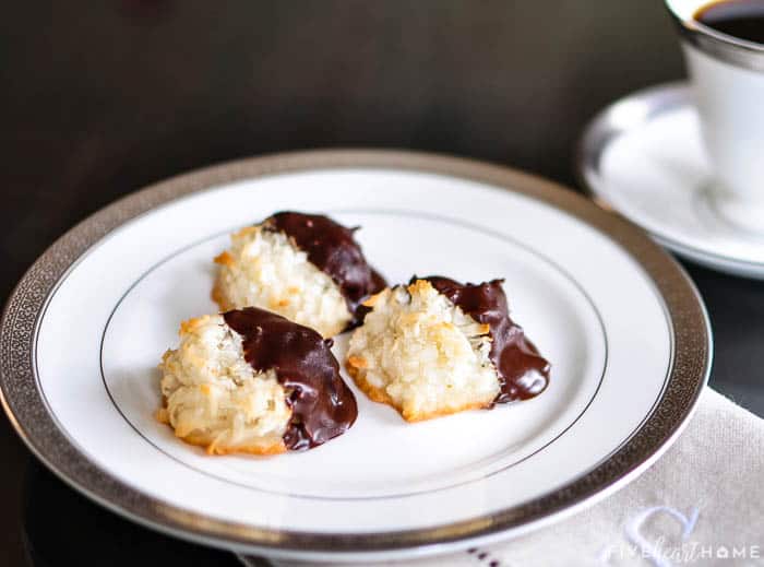 Coconut Macaroons ~ a chewy, delicious, and easy to make recipe with just six simple ingredients and NO condensed milk! | FiveHeartHome.com Chocolate Dipped Coconut Macaroons on a plate