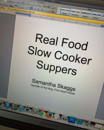 Laptop screen showing this wording: "Real Food Slow Cooker Suppers" by "Samantha Skaggs, founder of the blog, Five Heart Home"