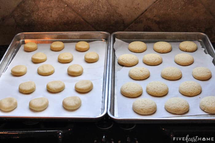 Two side-by-side baking pans lined with parchment paper and cookies, unbaked on left and baked on right.