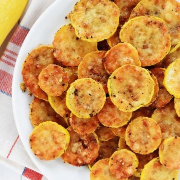 Baked Yellow Squash Rounds on a plate, aerial view