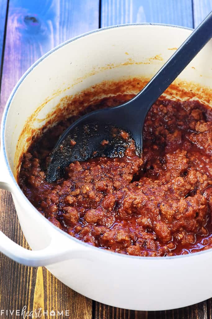 Homemade Sloppy Joe recipe in pot with spoon.