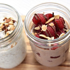 Aerial view of garnished jars of Overnight Oats.