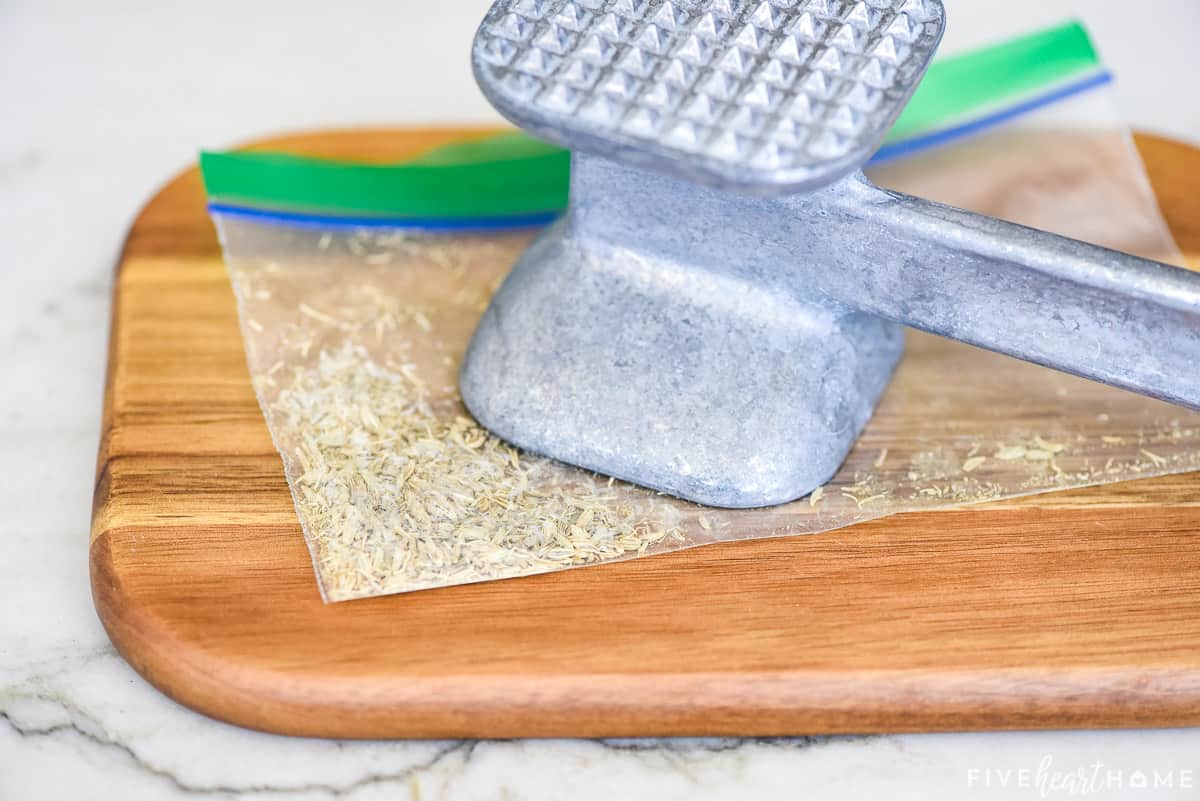 How to crush fennel seeds with a mallet.