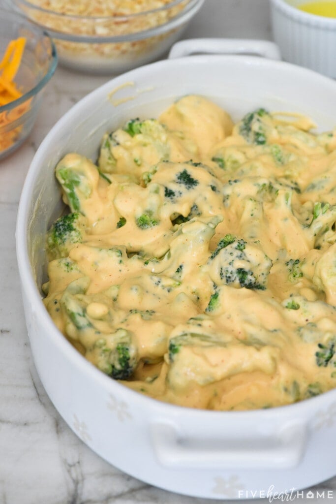 Broccoli Cheese Casserole mixture spread into baking dish.