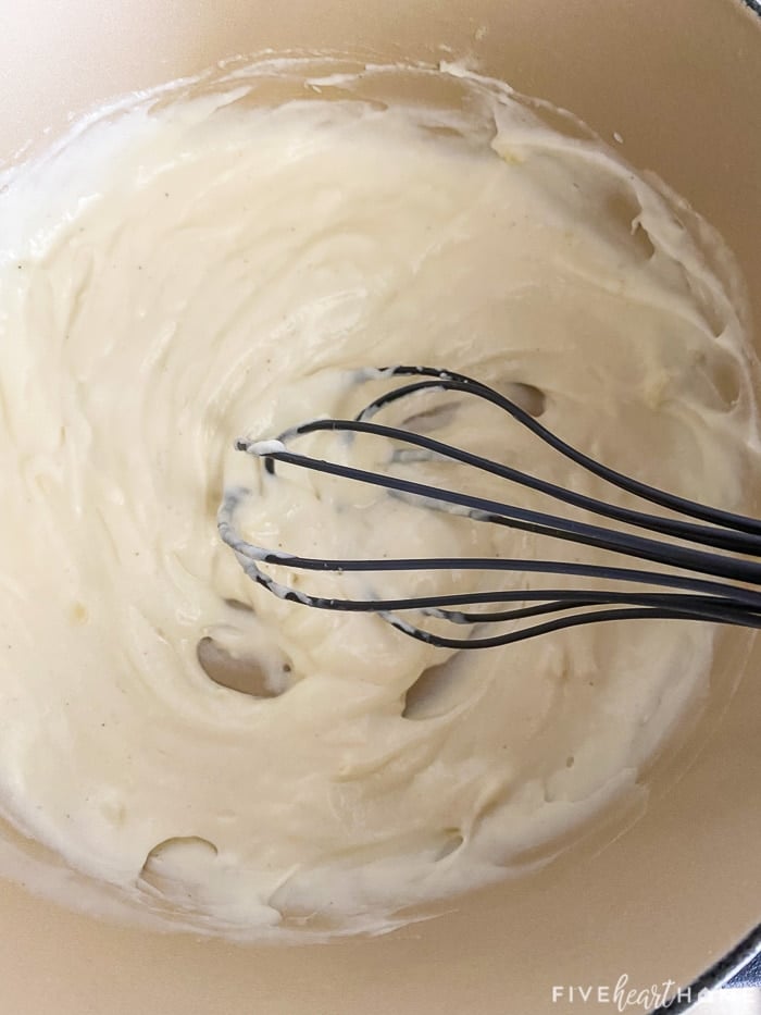 Cream cheese whisked into sauce.