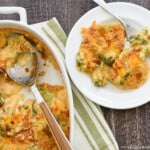 Aerial view of Broccoli Cheese Casserole in a baking dish and on a plate.