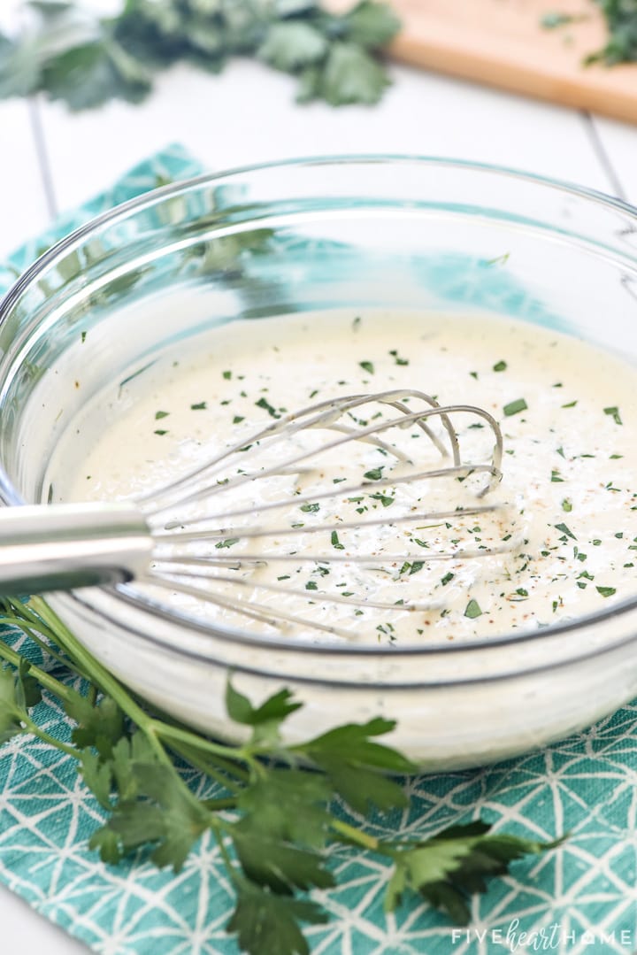 Homemade Ranch Dressing recipe ready to enjoy over a salad.
