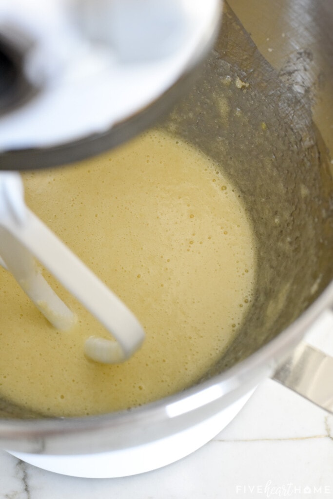 Eggs beaten into butter and sugar mixture.