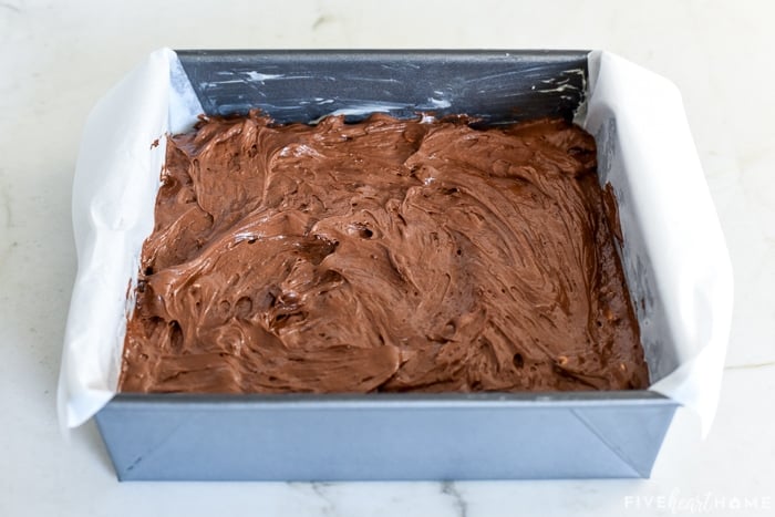Peanut Butter Brownie recipe spread into prepared baking pan.