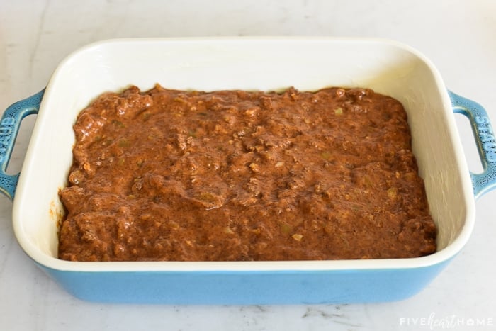 Beef mixture in bottom of baking dish.