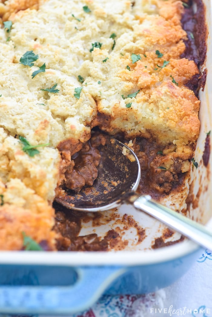 Spoonful removed from Tamale Pie in baking dish.