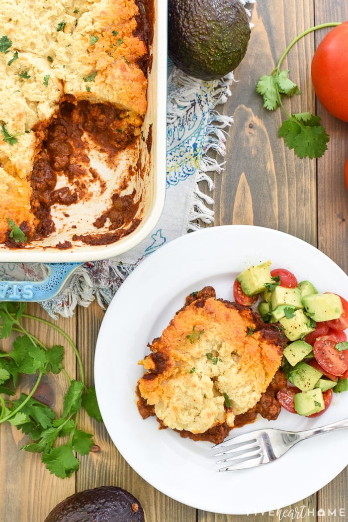 Aerial view of Tamale Pie recipe in baking dish and on plate.