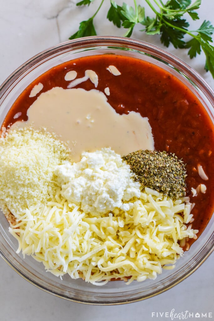 Aerial view of sauce ingredients in bowl.