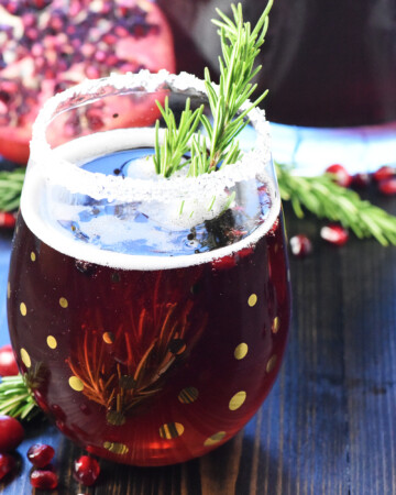 Christmas Punch in glass with garnish.