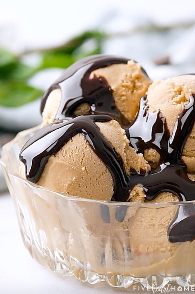 Close-up of ice cream with chocolate syrup.