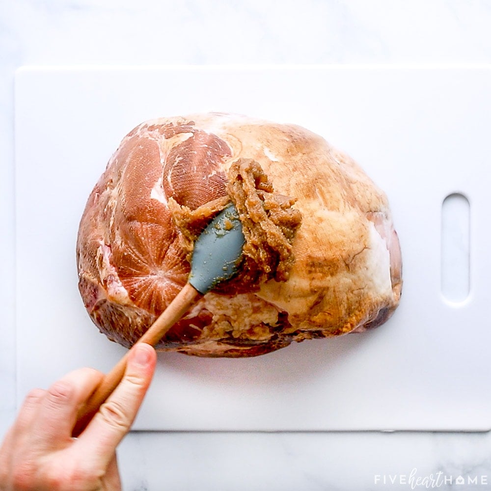 Glazing Slow Cooker Brown Sugar Ham.