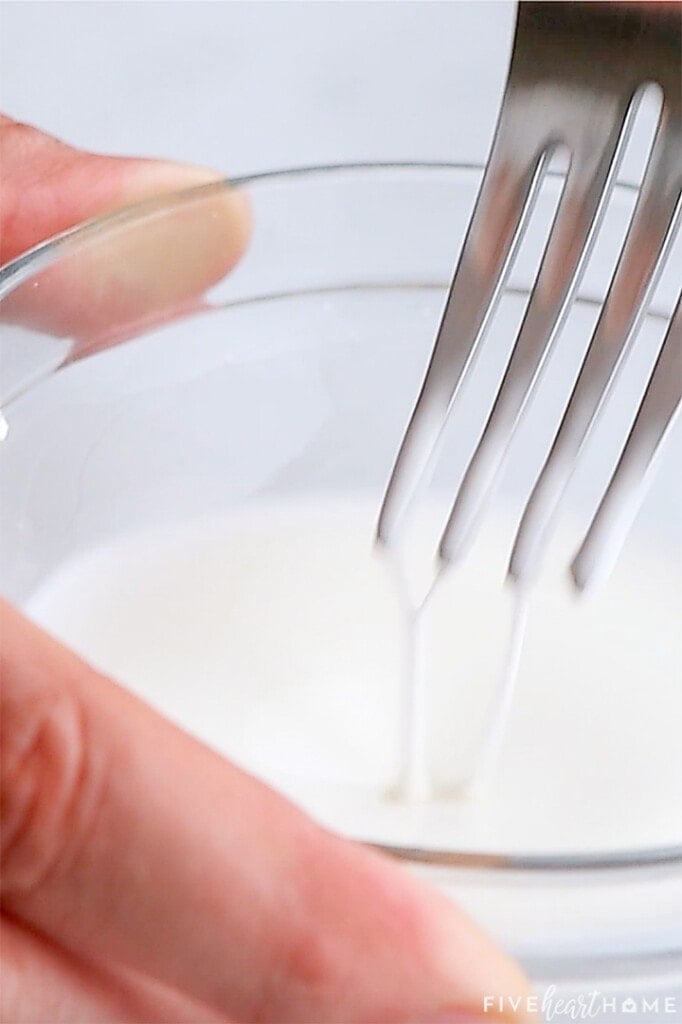 Stirring together cornstarch slurry.