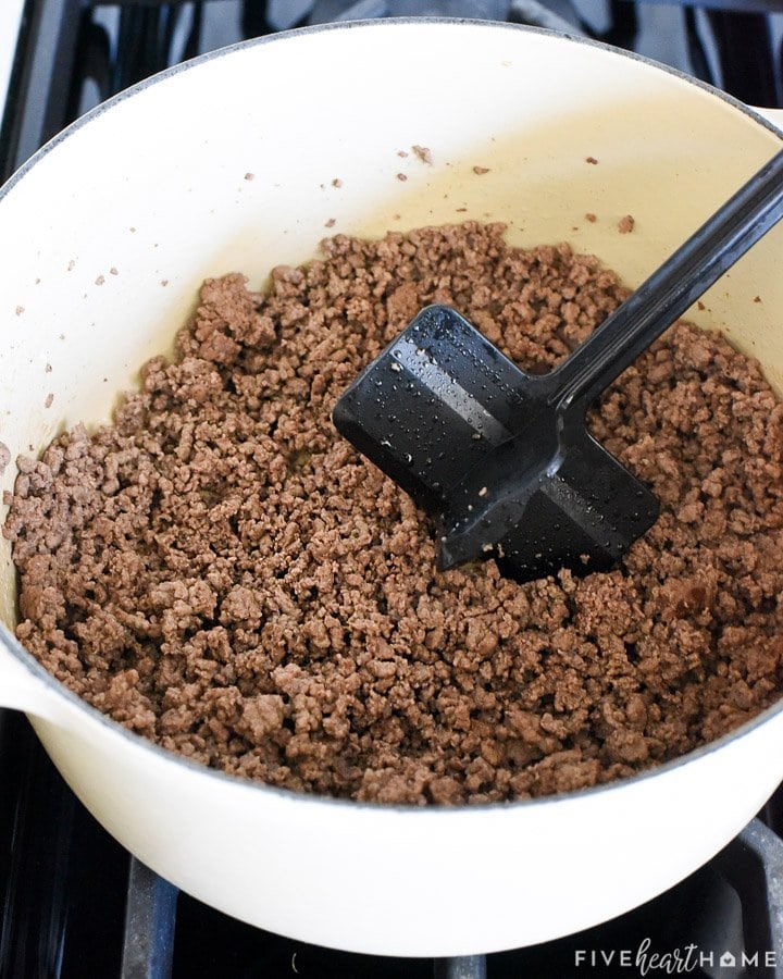 Browned ground beef on stove.