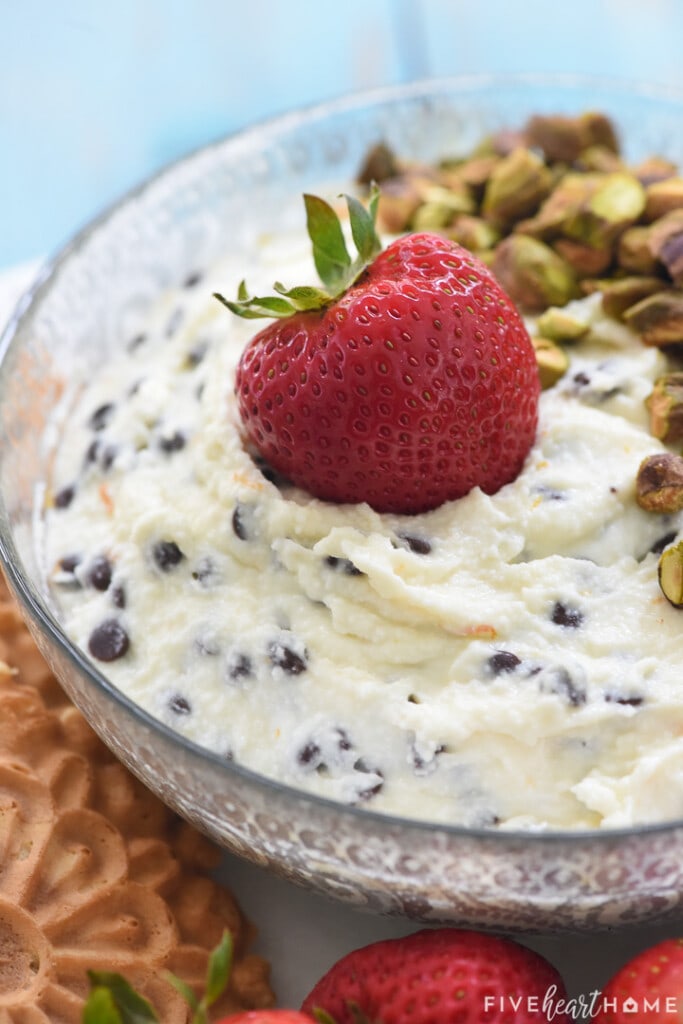 Strawberry dipped in Cannoli Dip recipe.