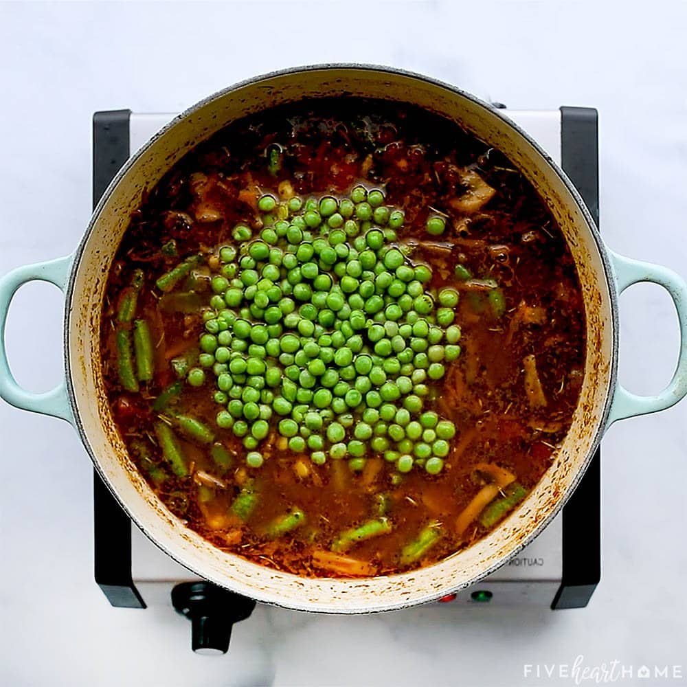 Frozen peas ready to be stirred in.