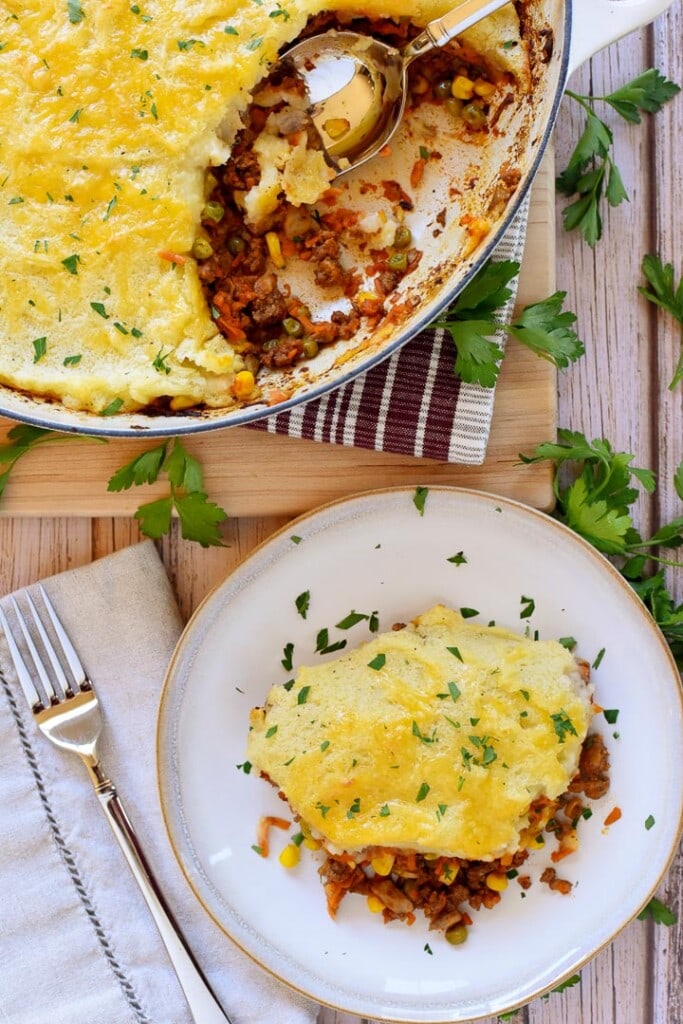 Aerial view of Easy Shepherd's Pie recipe in skillet and on plate.