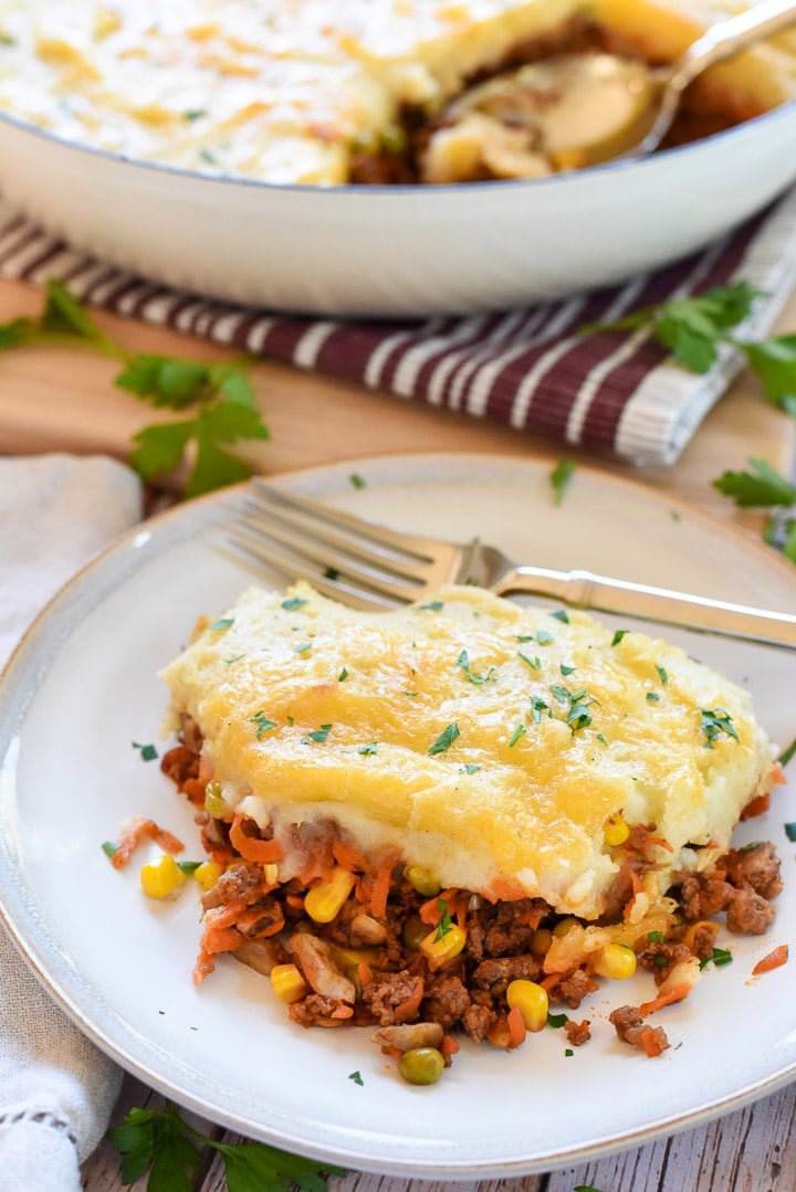 Shepherd's Pie recipe on plate with fork.