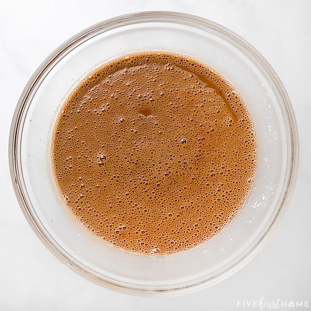 Chocolate pudding mixture in bowl before boiling.