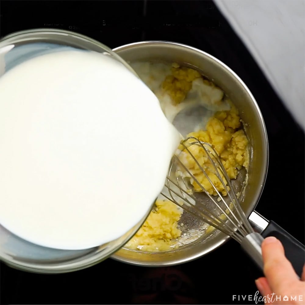 Blending milk into sauce for King Ranch Chicken.